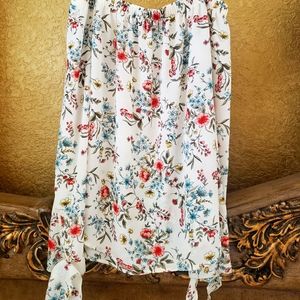 Beautiful off shoulder floral top. NEVER WORN